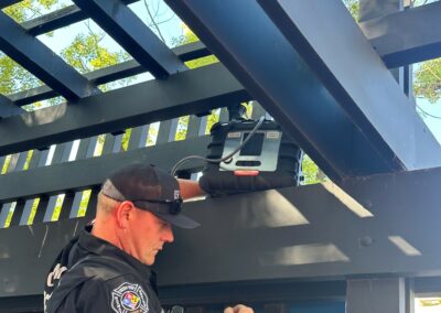 Firefighter demonstrating the use of monitoring equipment